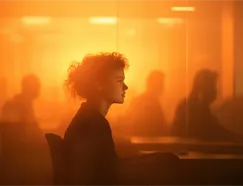 Team collaborating in a warm-lit office
