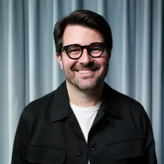 Portrait of Oliver Ecker, customer success lead